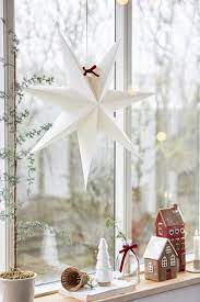 Medium White Paper 7 Sided Hanging Star